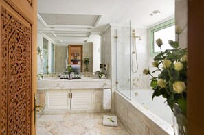 Combined shower/tub, free toiletries, hair dryer, bathrobes
