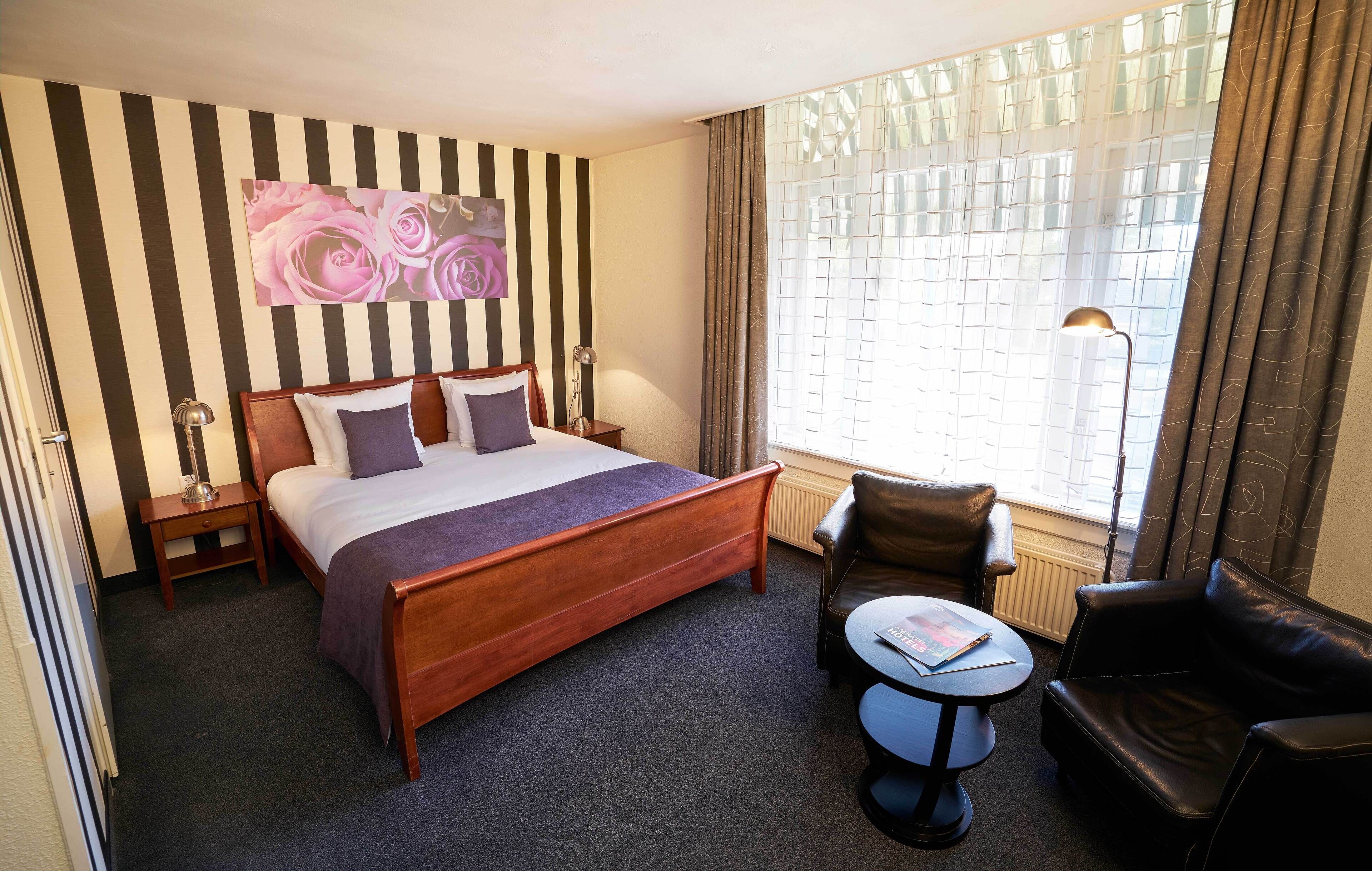 junior suite | 1 bedroom, in-room safe, desk, iron/ironing board