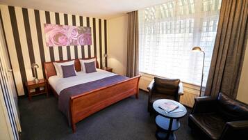 Suite – junior | Safe på rommet, skrivebord, strykejern/-brett og barnesenger