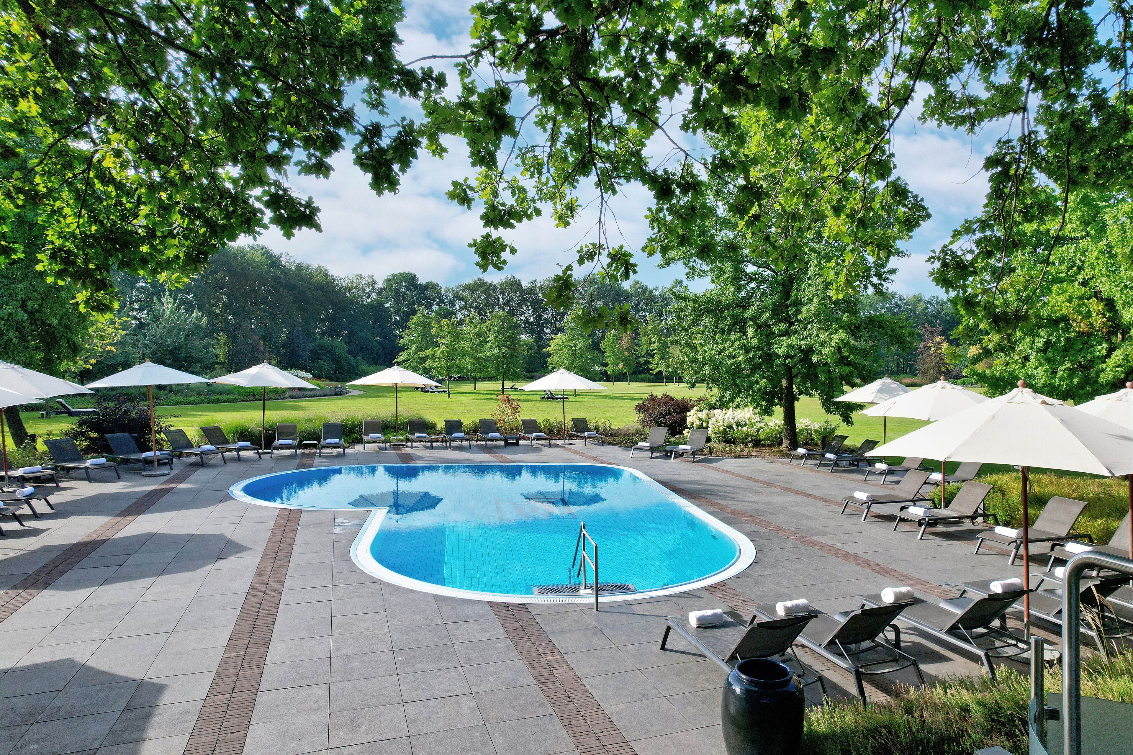 indoor pool, seasonal outdoor pool, pool umbrellas, pool loungers