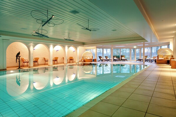 Indoor pool, seasonal outdoor pool, pool umbrellas, pool loungers