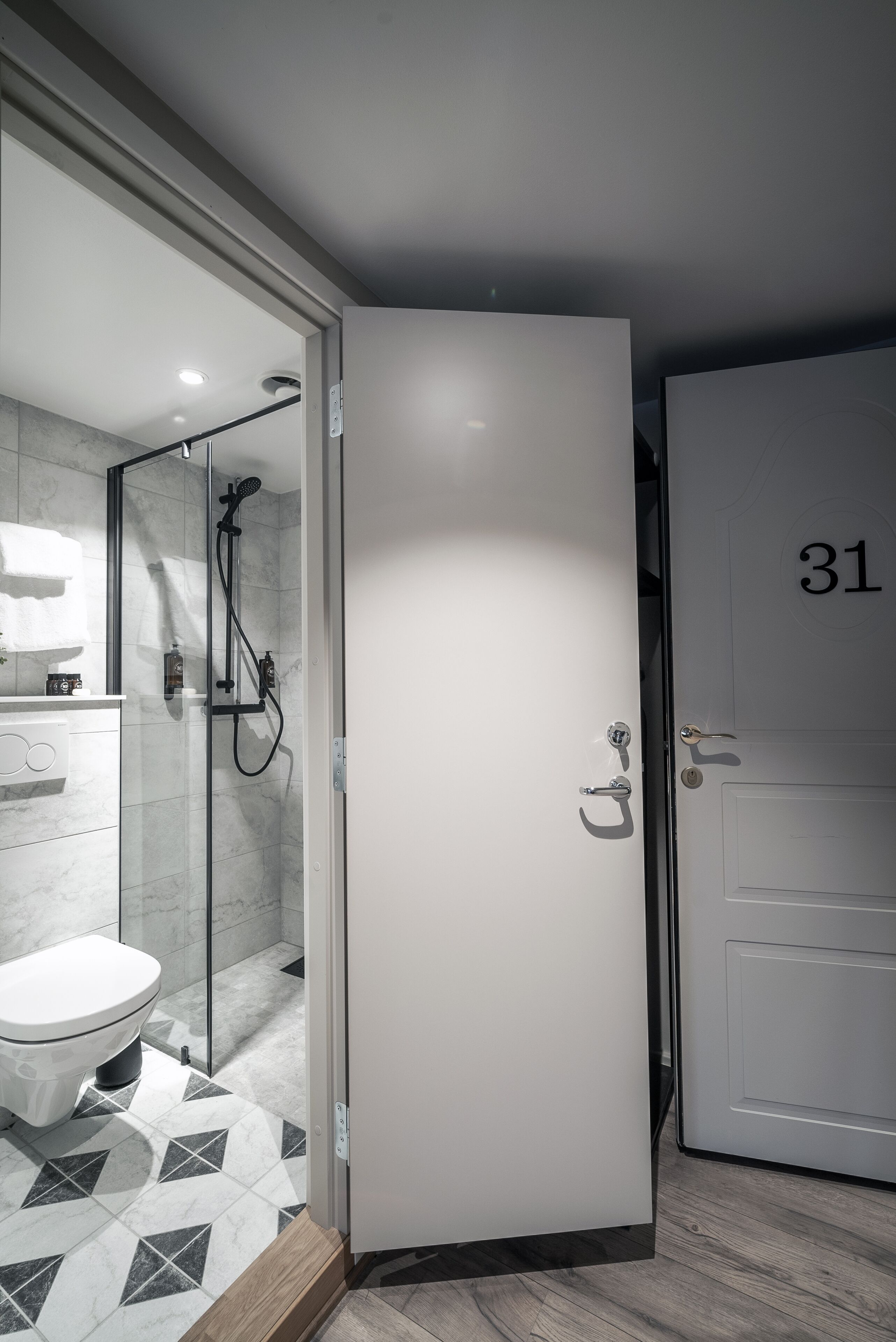 designer toiletries, hair dryer, heated floors, towels