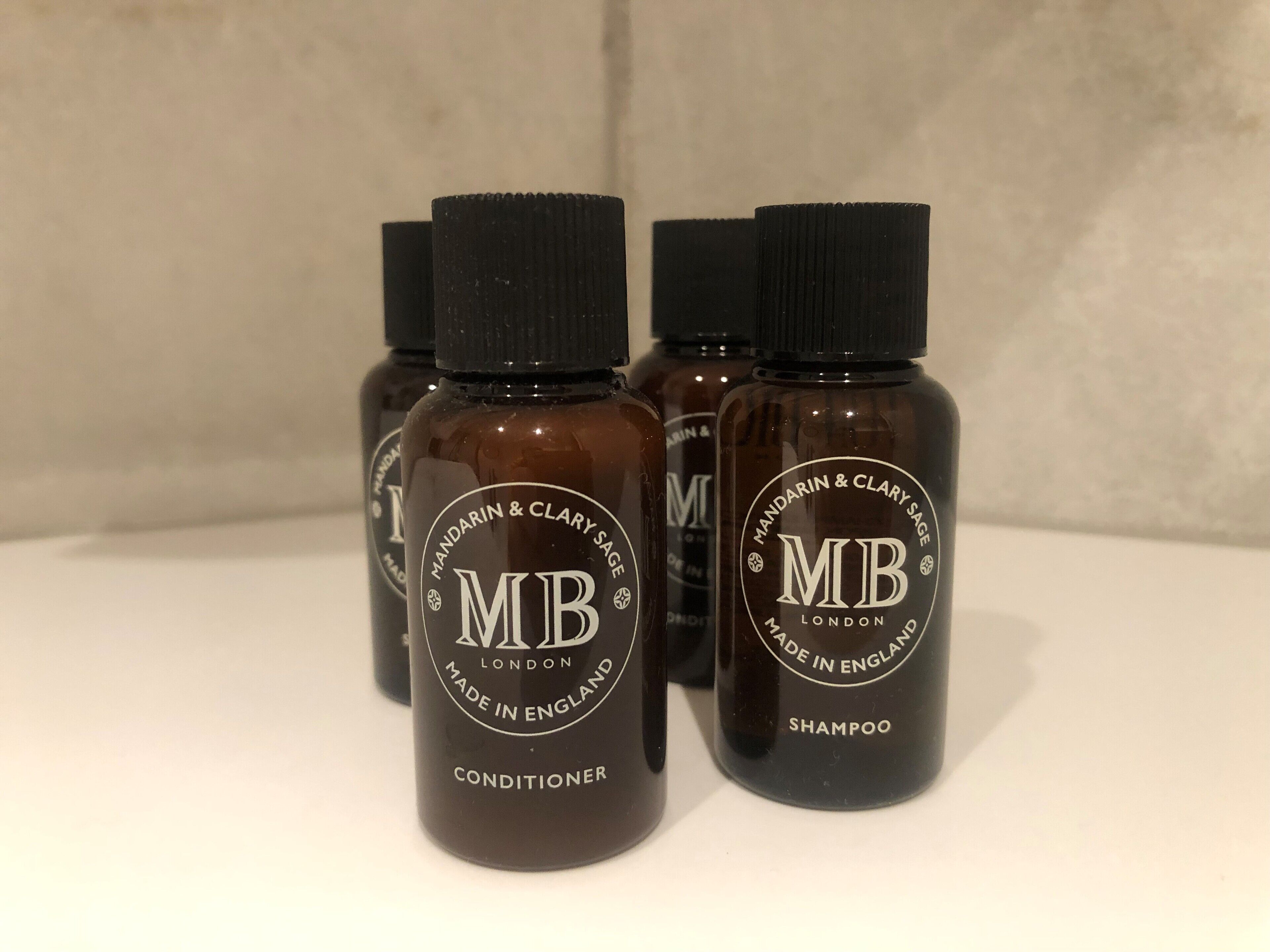 designer toiletries, hair dryer, heated floors, towels