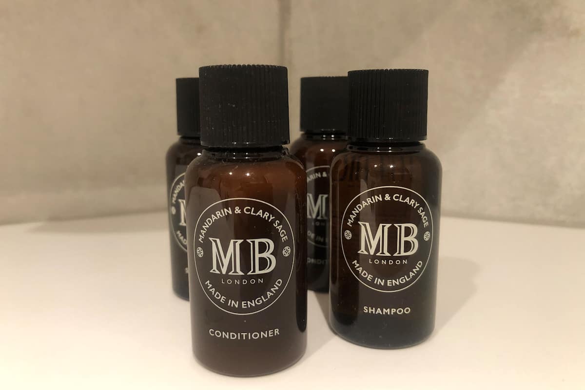 designer toiletries, hair dryer, heated floors, towels