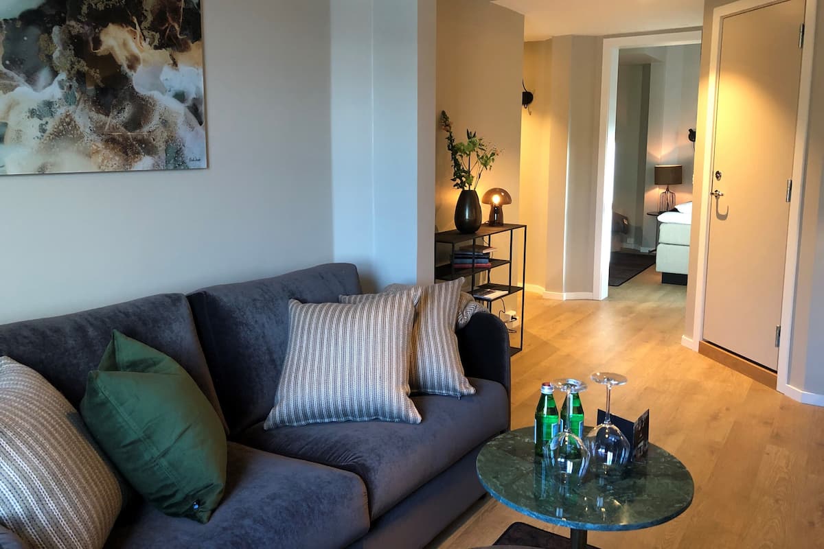 Junior suite | 1 bedroom, down comforters, pillowtop beds, individually decorated