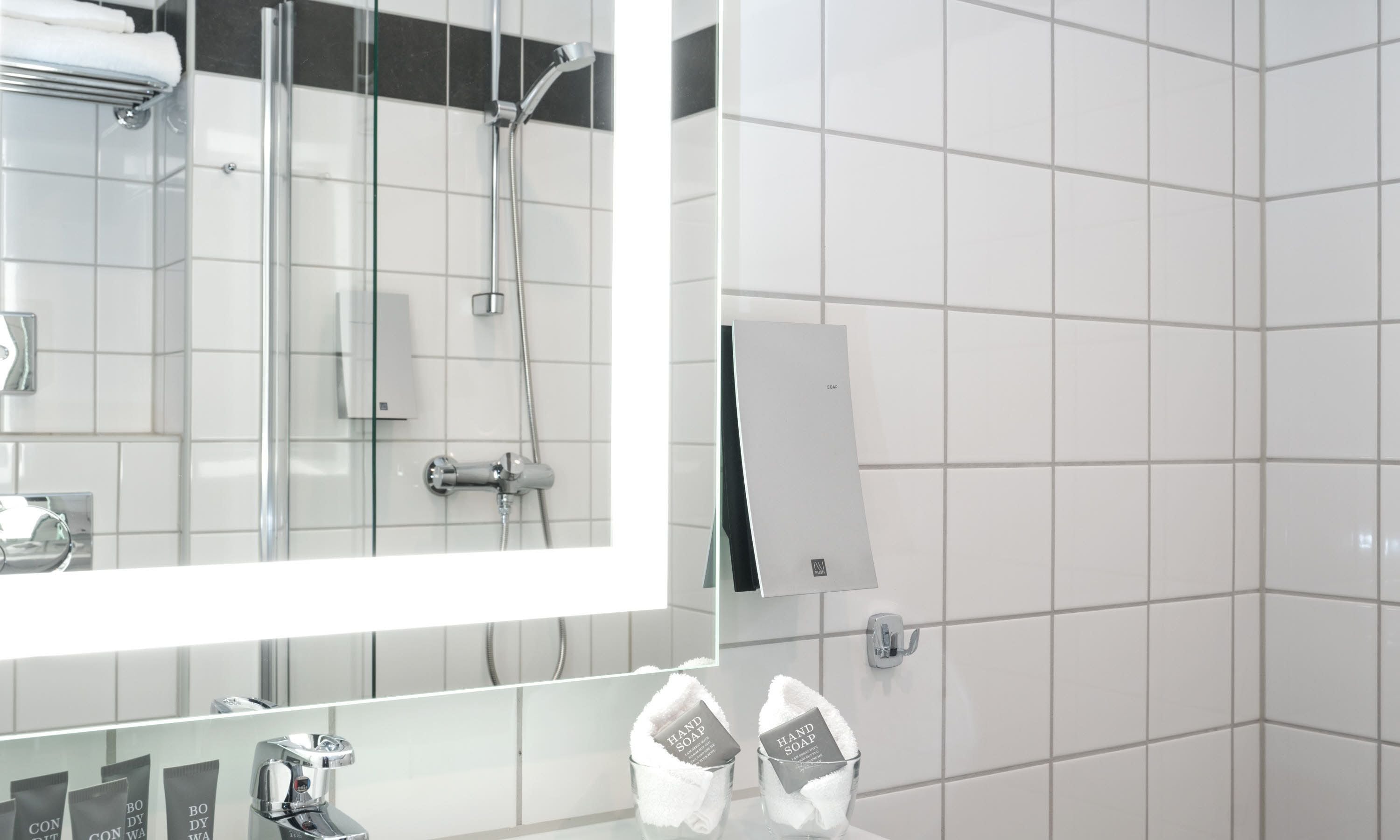 shower, free toiletries, hair dryer, towels