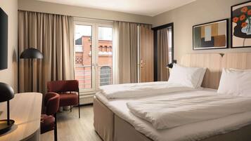 Suite – junior | Safe på rommet, skrivebord, wi-fi (inkludert) og sengetøy