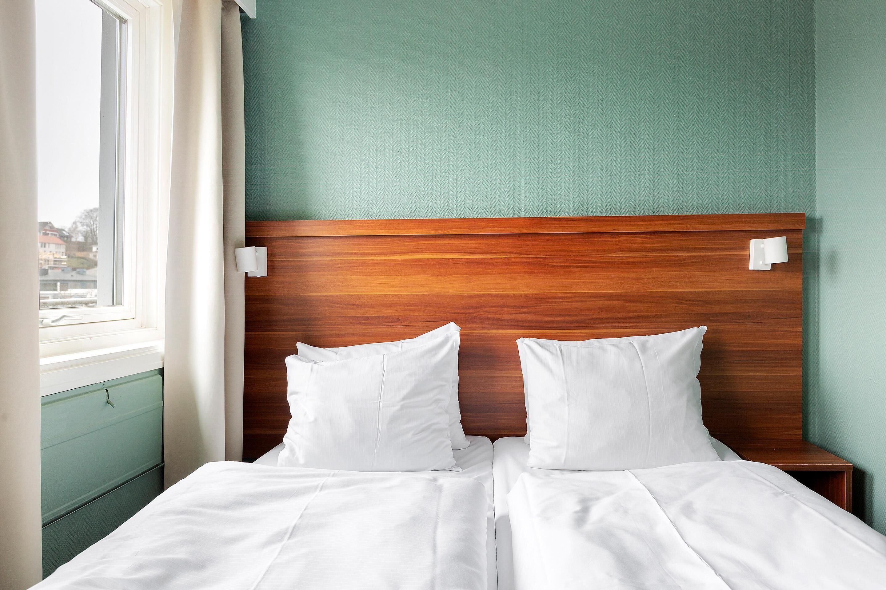 Economy Room, 2 Twin Beds, Non Smoking | Desk, free WiFi, bed sheets