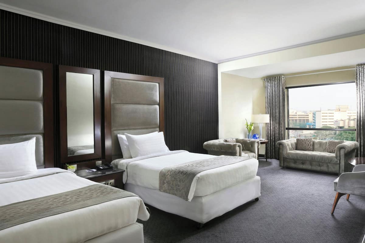 Classic Room, 2 Twin Beds, City View | Minibar, in-room safe, iron/ironing board, WiFi