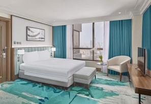 Premium bedding, down comforters, minibar, in-room safe