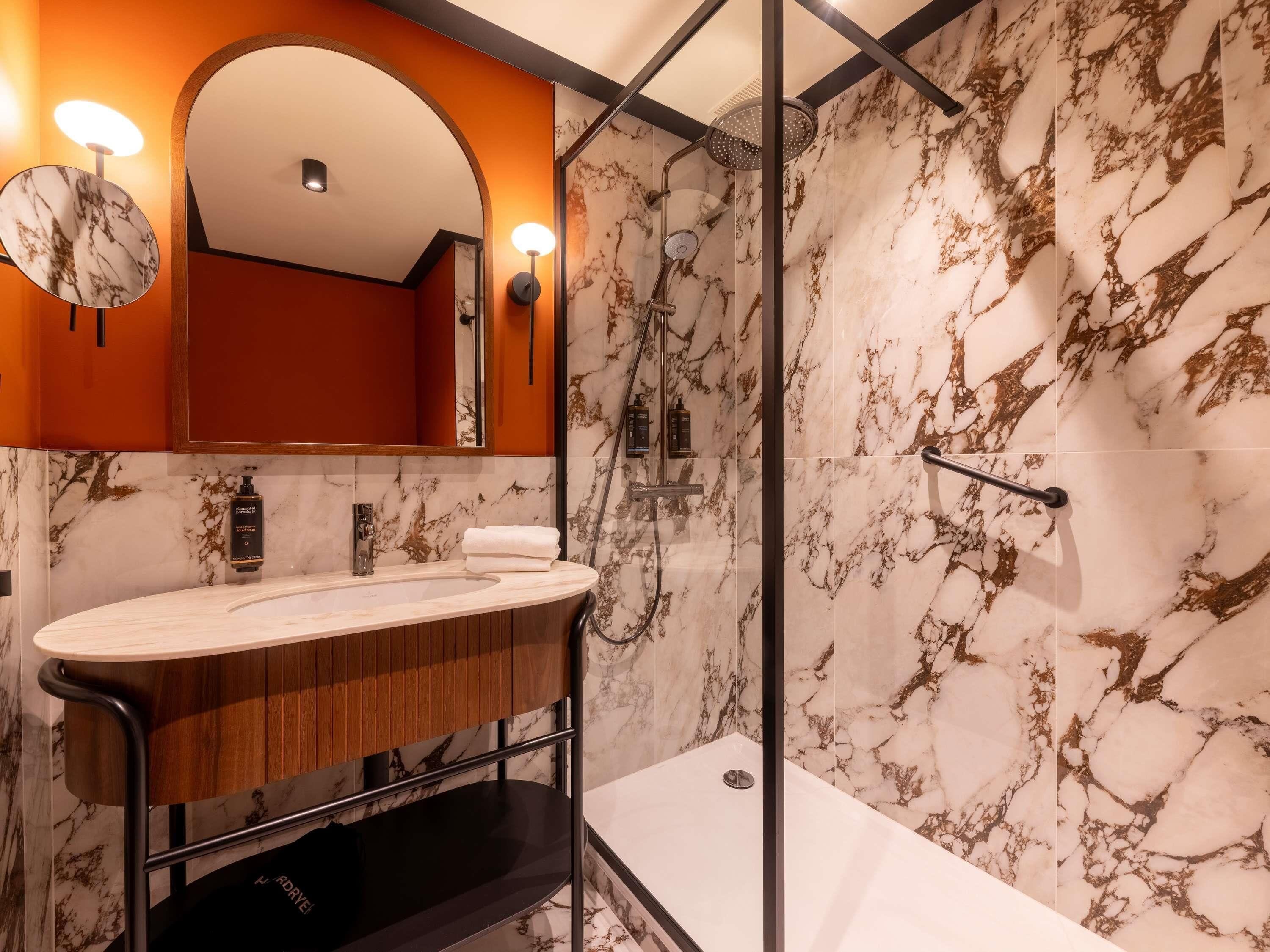 Shower, eco-friendly toiletries, hair dryer, towels