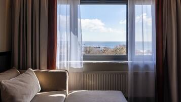 Executive Suite, 1 Queen Bed, Sea View | Desk, iron/ironing board, rollaway beds, free WiFi