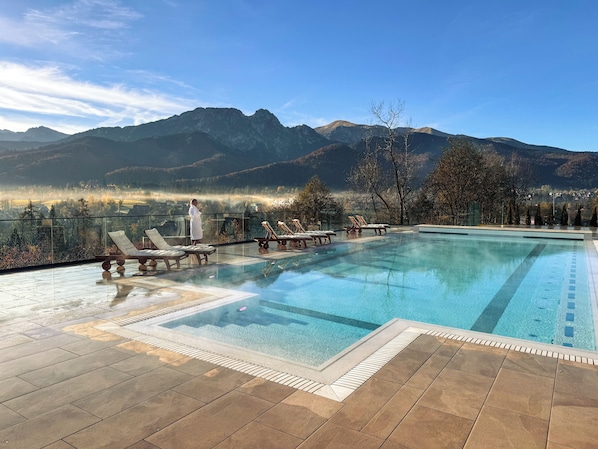 Indoor pool, outdoor pool, open noon to 6:00 PM, sun loungers