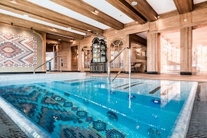 Indoor pool, outdoor pool, open noon to 6:00 PM, sun loungers