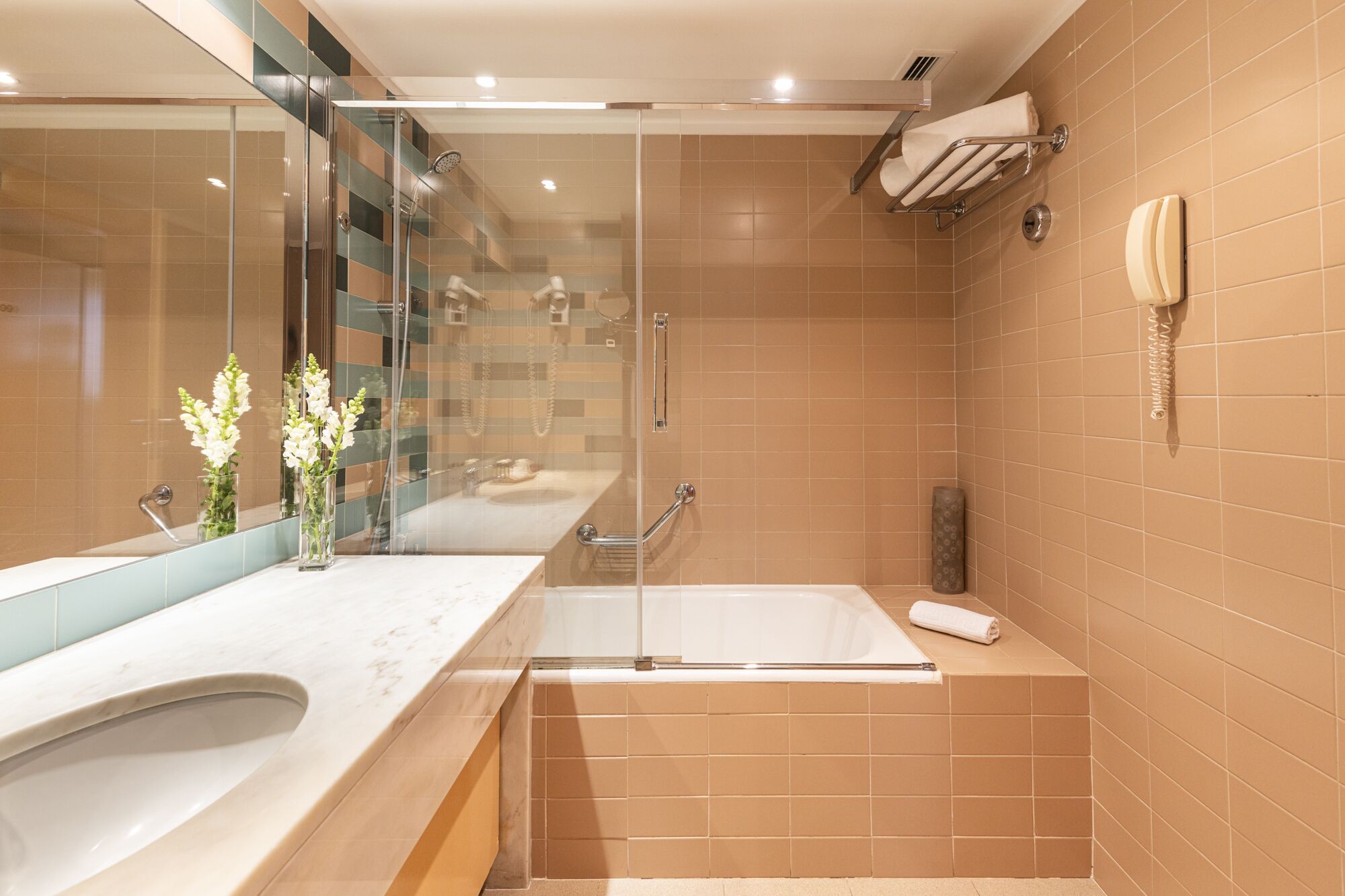 junior studio suite | bathroom | bathtub, hair dryer, bidet, towels