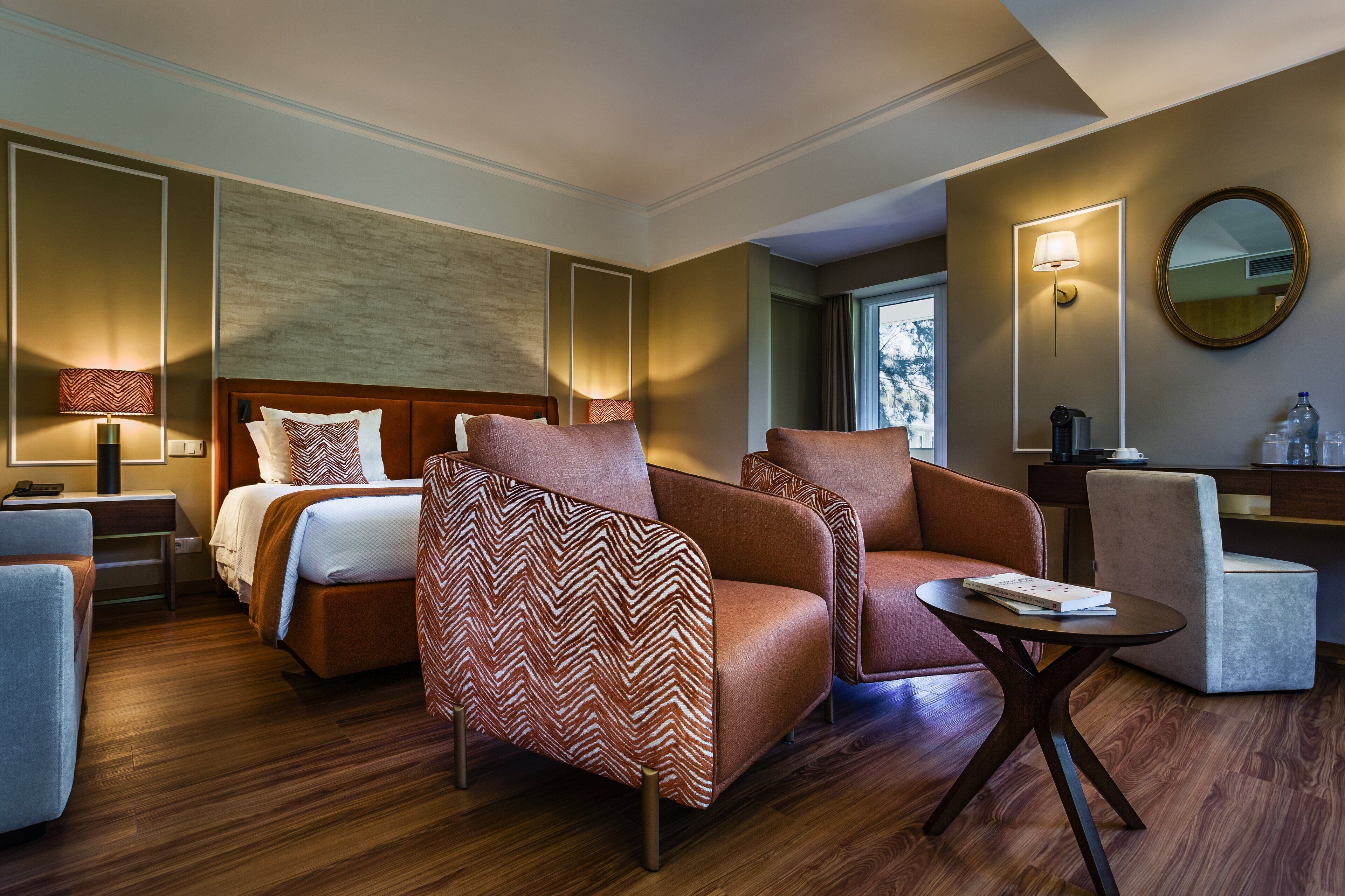 junior suite | minibar, in-room safe, individually decorated, individually furnished