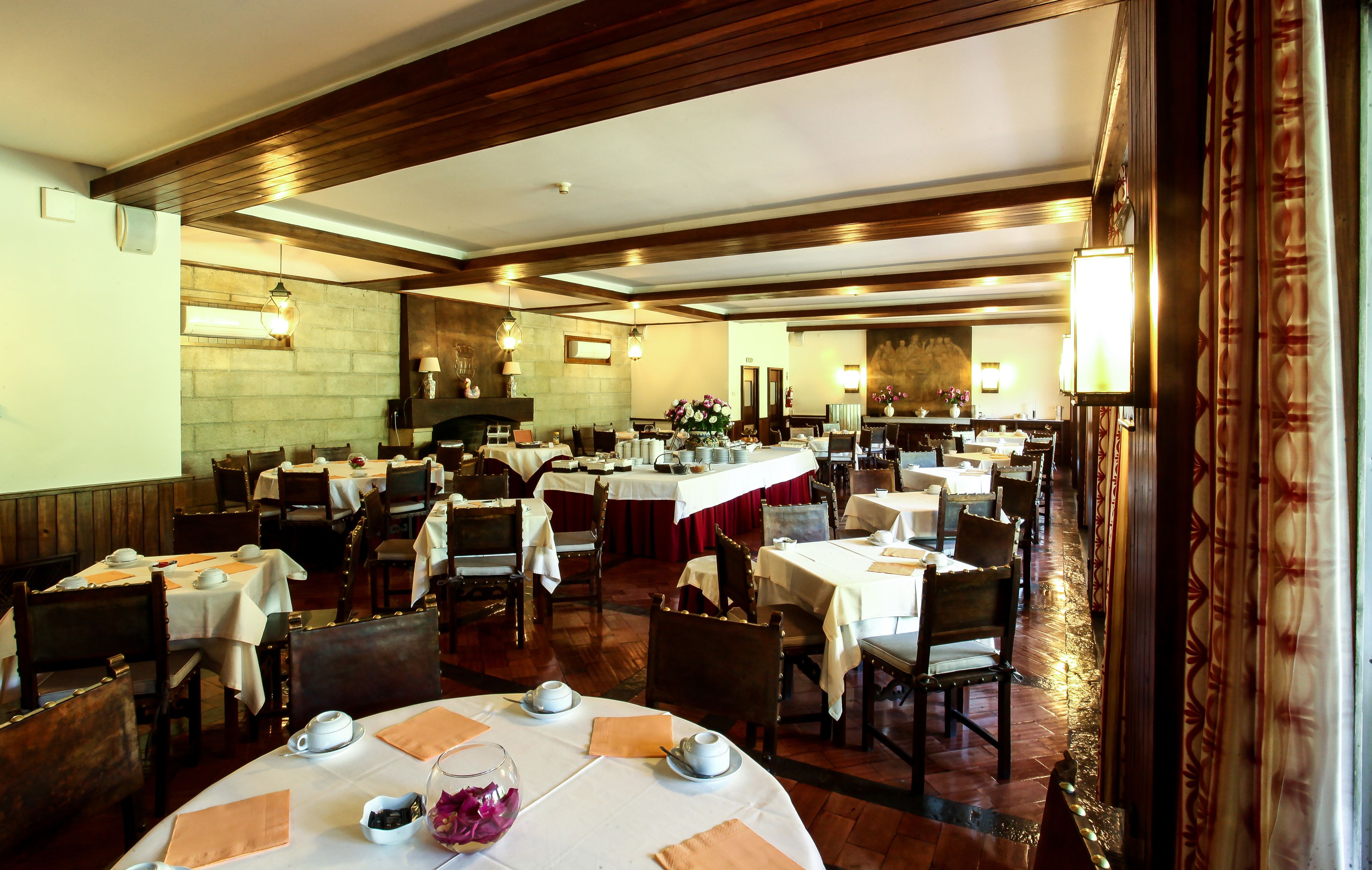 Breakfast, lunch, dinner served; Portuguese cuisine, garden views 