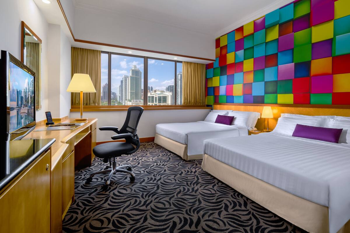 Family Room, 2 Queen Beds | Minibar, in-room safe, desk, laptop workspace