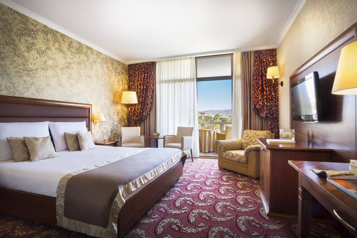 Standard Double or Twin Room, Balcony, Park View | Minibar, in-room safe, desk, blackout drapes