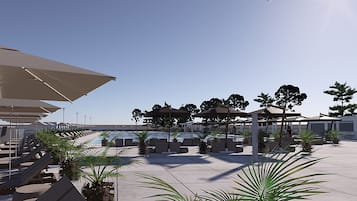 Seasonal outdoor pool, pool umbrellas, pool loungers