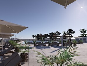 Piscine extérieure (ouverte en saison), parasols de plage