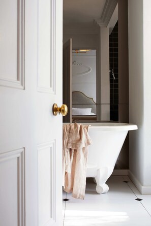 Classic Suite | Bathroom | Rainfall showerhead, designer toiletries, hair dryer, bathrobes