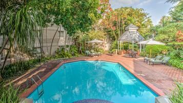 Outdoor pool, pool umbrellas, pool loungers