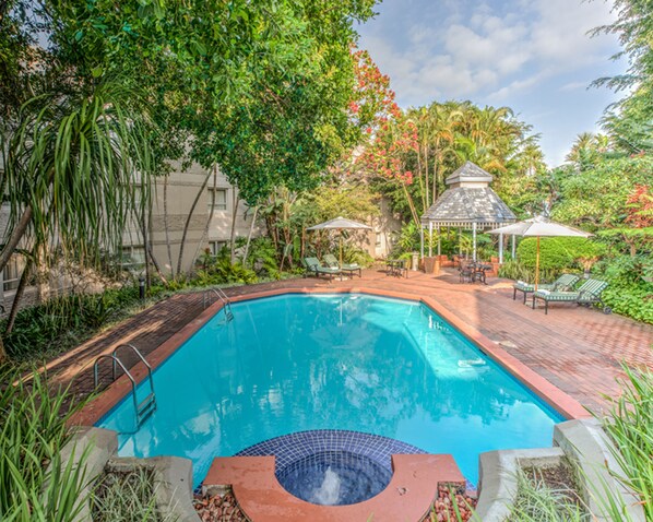 Outdoor pool, pool umbrellas, pool loungers