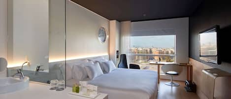 Premium bedding, down duvets, minibar, in-room safe