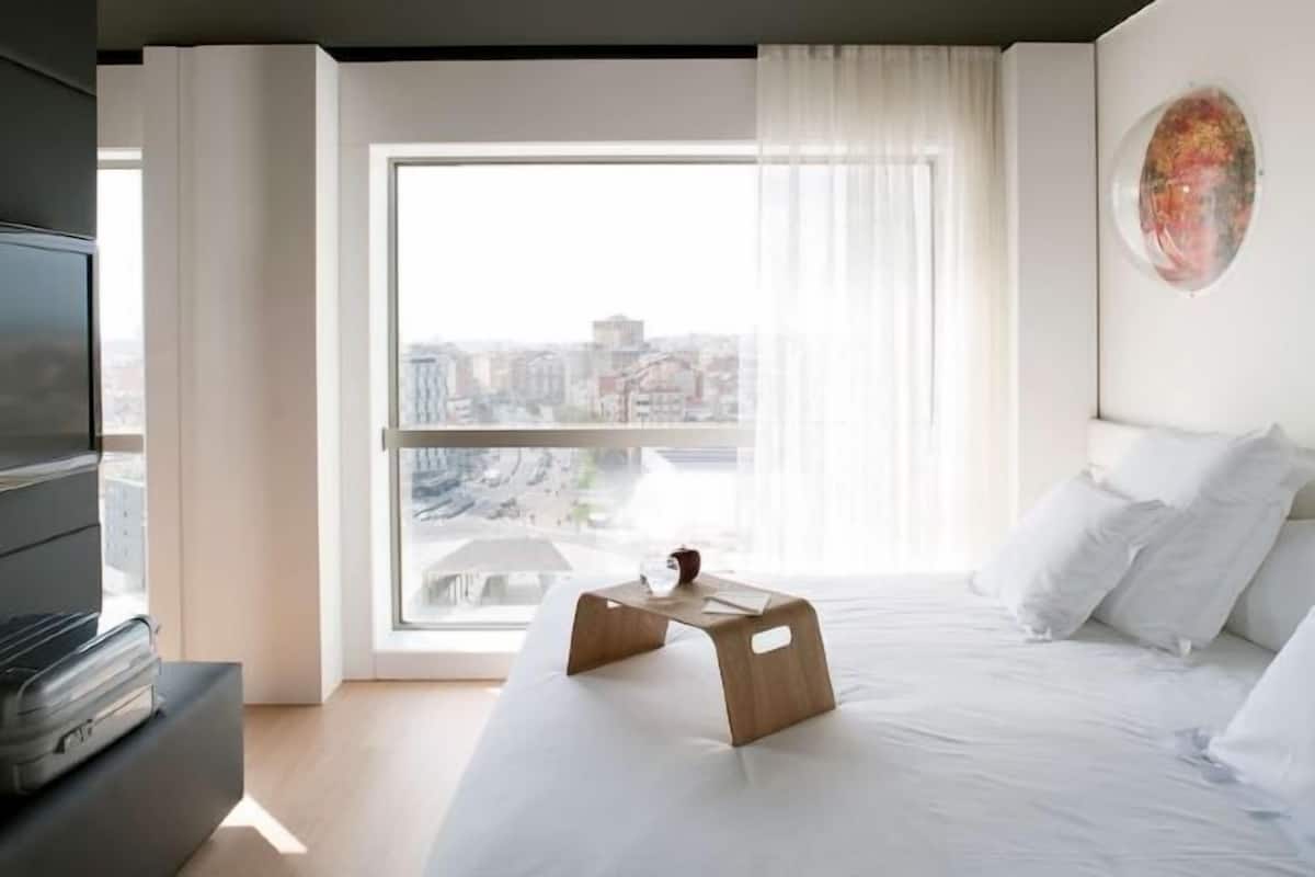 Premium bedding, down comforters, minibar, in-room safe