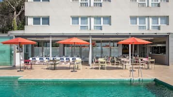 Outdoor pool, pool umbrellas, pool loungers