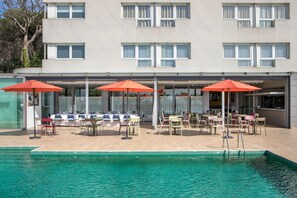 Outdoor pool, pool umbrellas, sun loungers