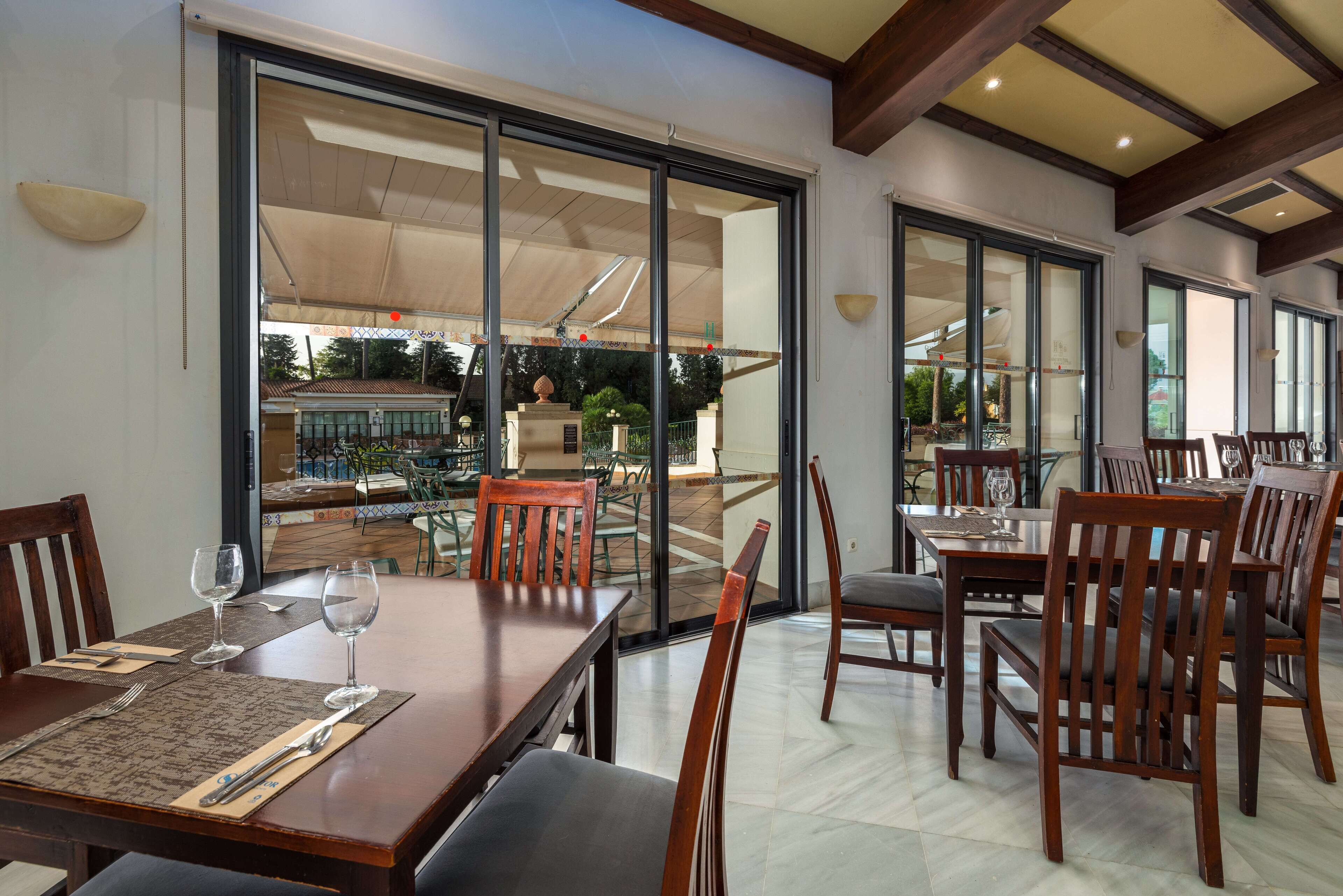 breakfast, lunch, dinner served; spanish cuisine, pool views