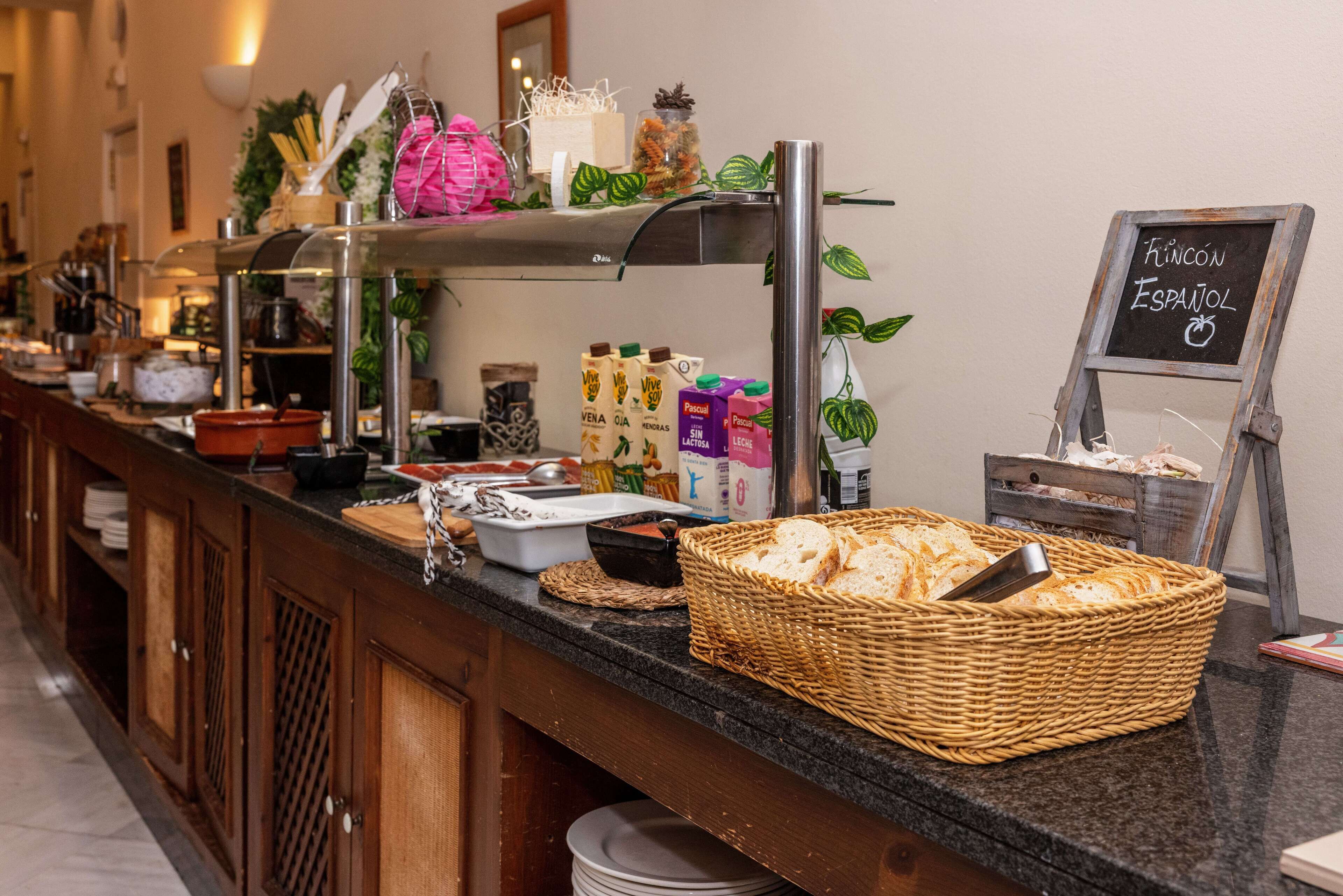 breakfast, lunch, dinner served; spanish cuisine, pool views