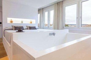Junior Suite (2 Adults) | Minibar, in-room safe, desk, laptop workspace