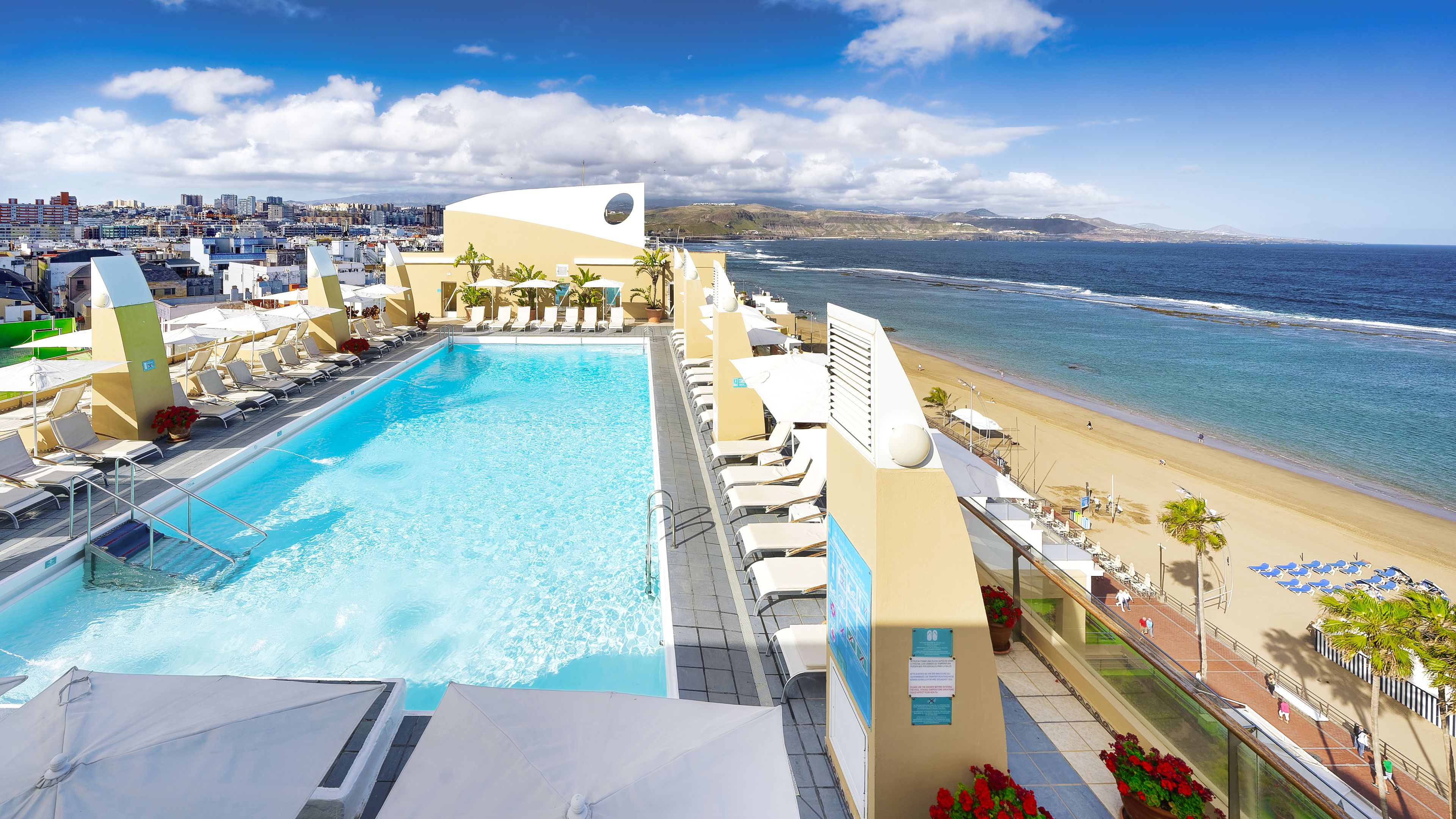 Outdoor pool, pool umbrellas, pool loungers