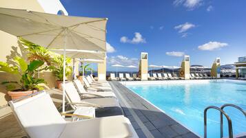 Outdoor pool, pool umbrellas, pool loungers