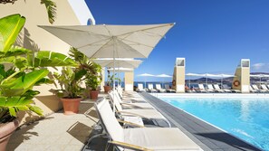 Outdoor pool, pool umbrellas, pool loungers