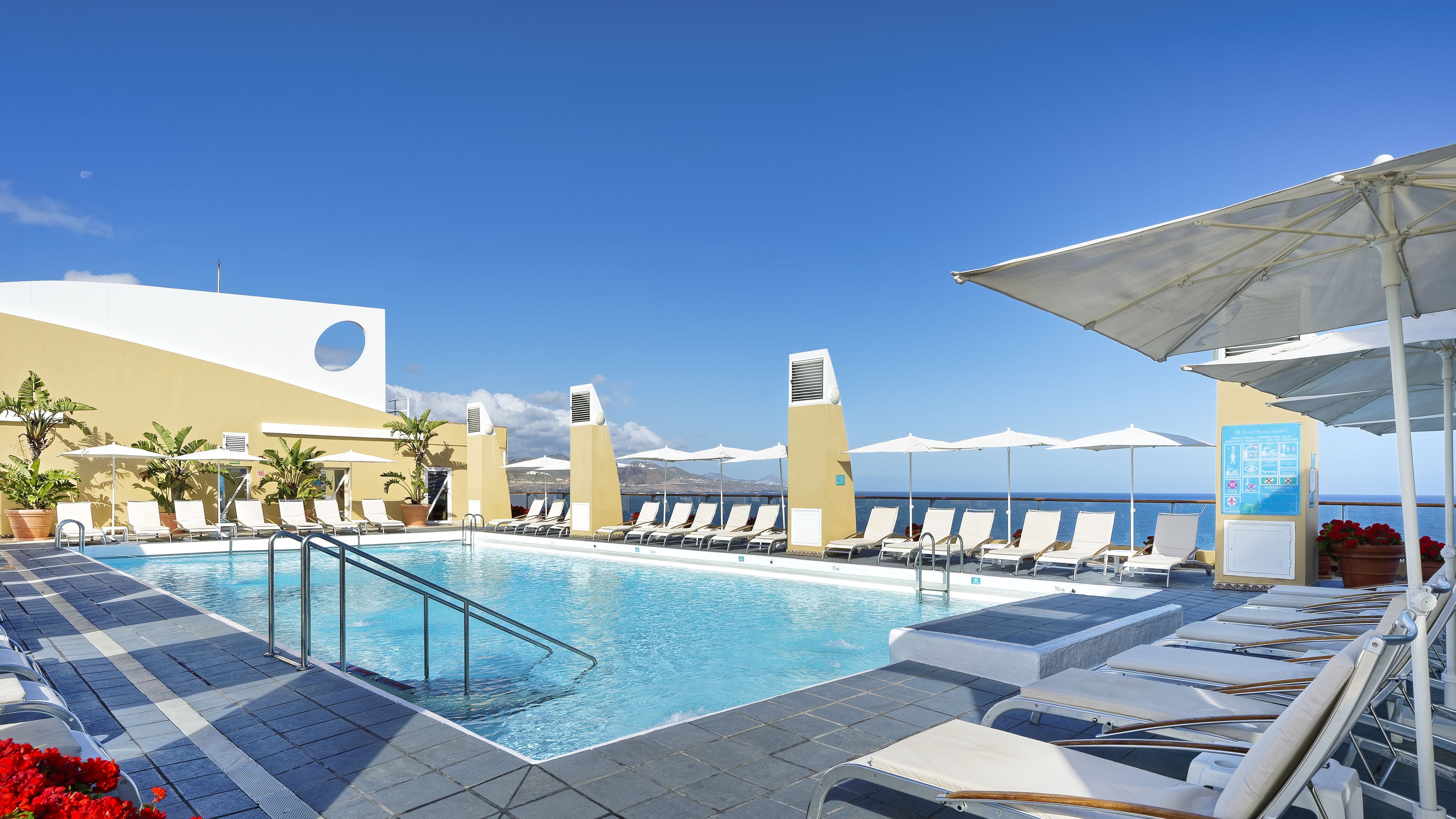 Outdoor pool, pool umbrellas, pool loungers