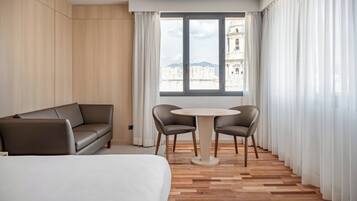 Standard Room, 1 King Bed (View) | Minibar, in-room safe, desk, laptop workspace
