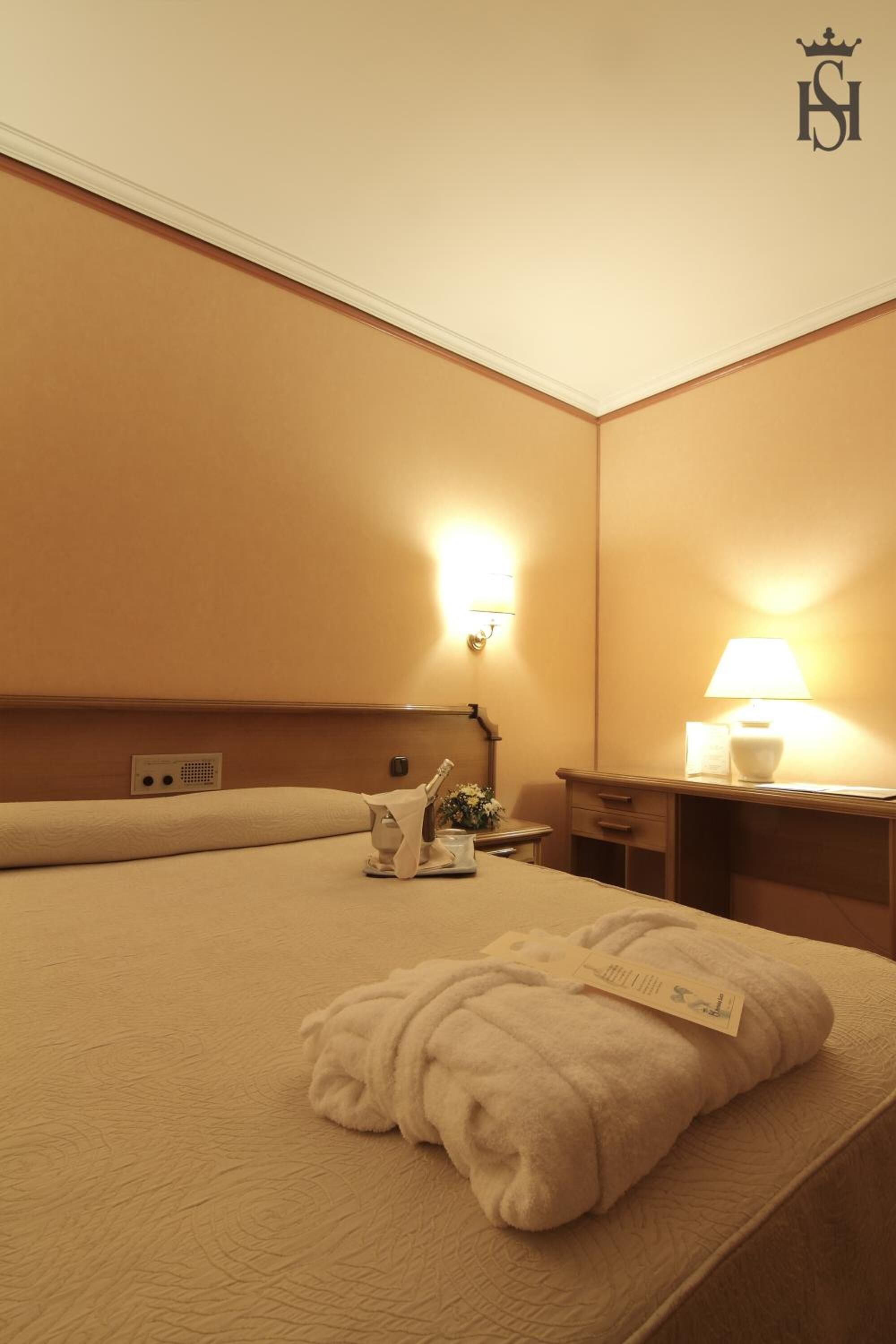 minibar, desk, blackout curtains, iron/ironing board