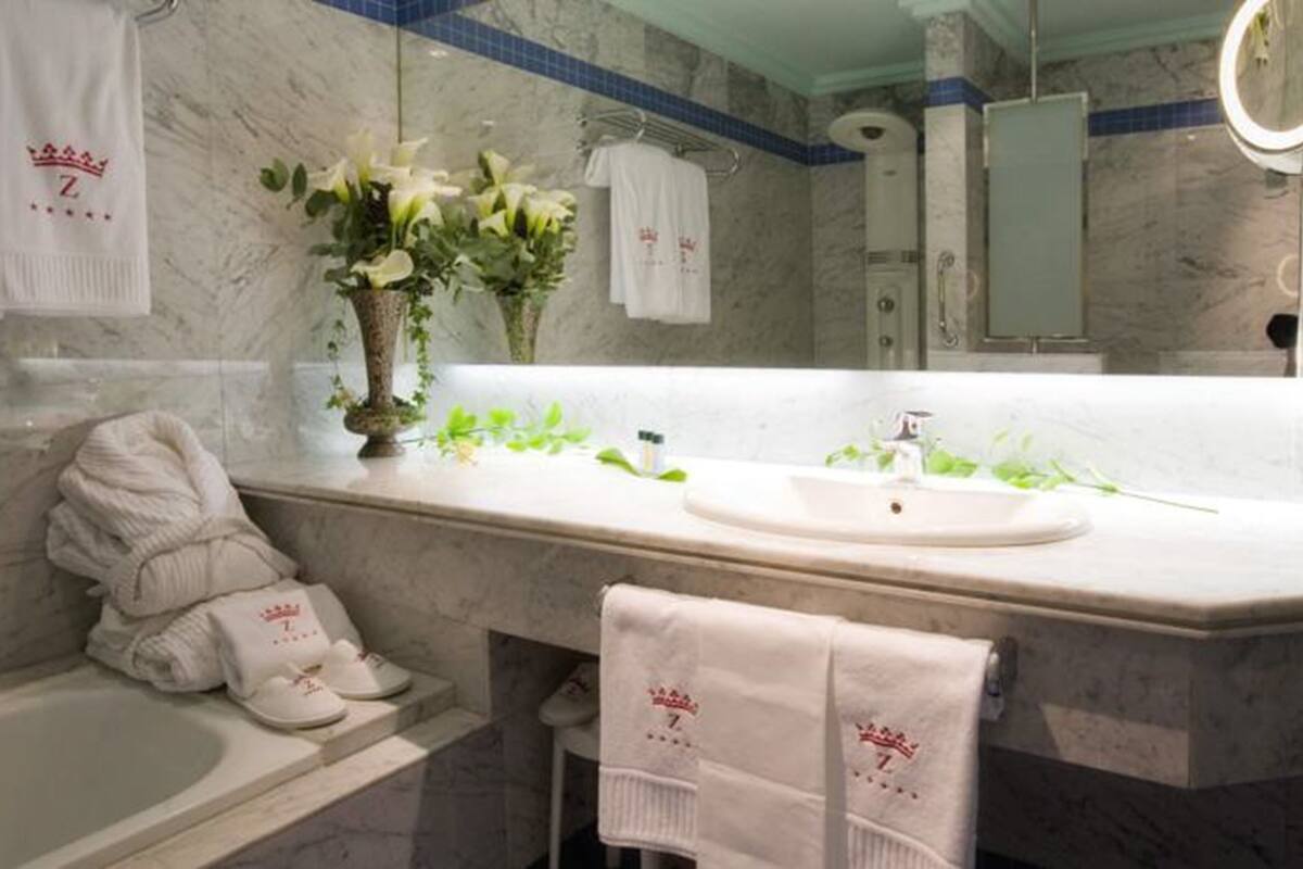 free toiletries, hair dryer, bidet, towels