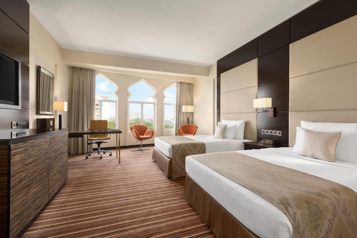 Premium bedding, down duvets, pillow-top beds, minibar