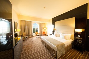 Premium bedding, down comforters, pillowtop beds, minibar