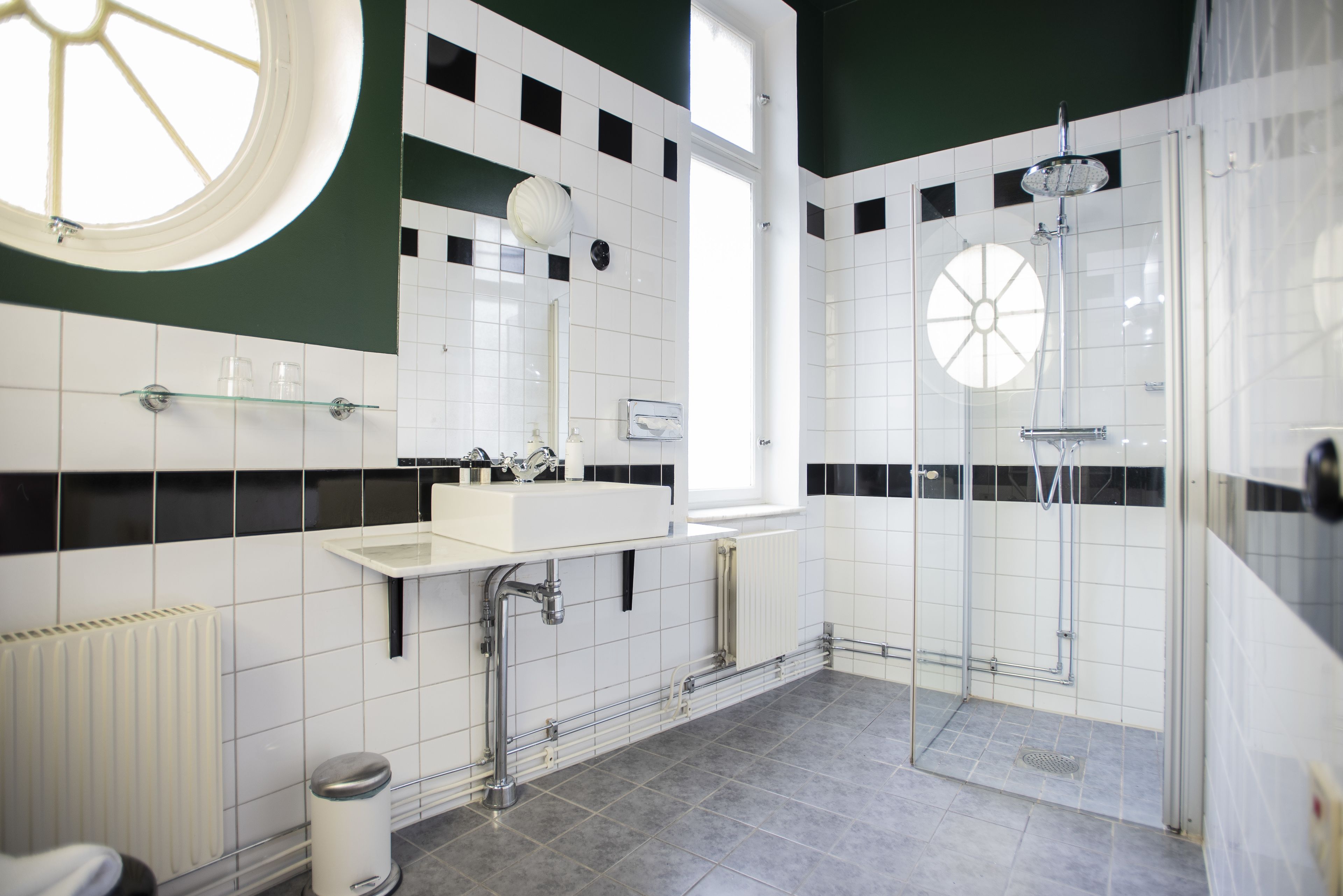 shower, designer toiletries, hair dryer, towels