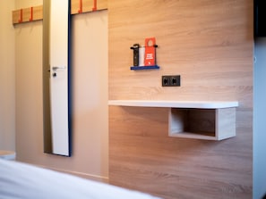 Laptop workspace, blackout curtains, free WiFi, bed sheets