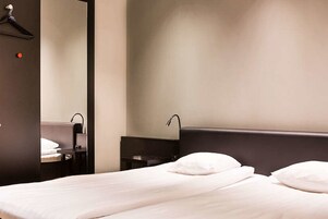 Blackout drapes, WiFi (free), bed sheets