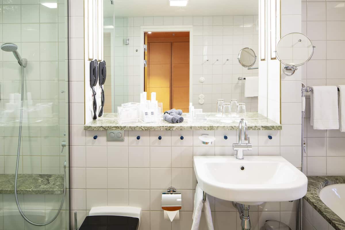 shower, rainfall showerhead, designer toiletries, hair dryer