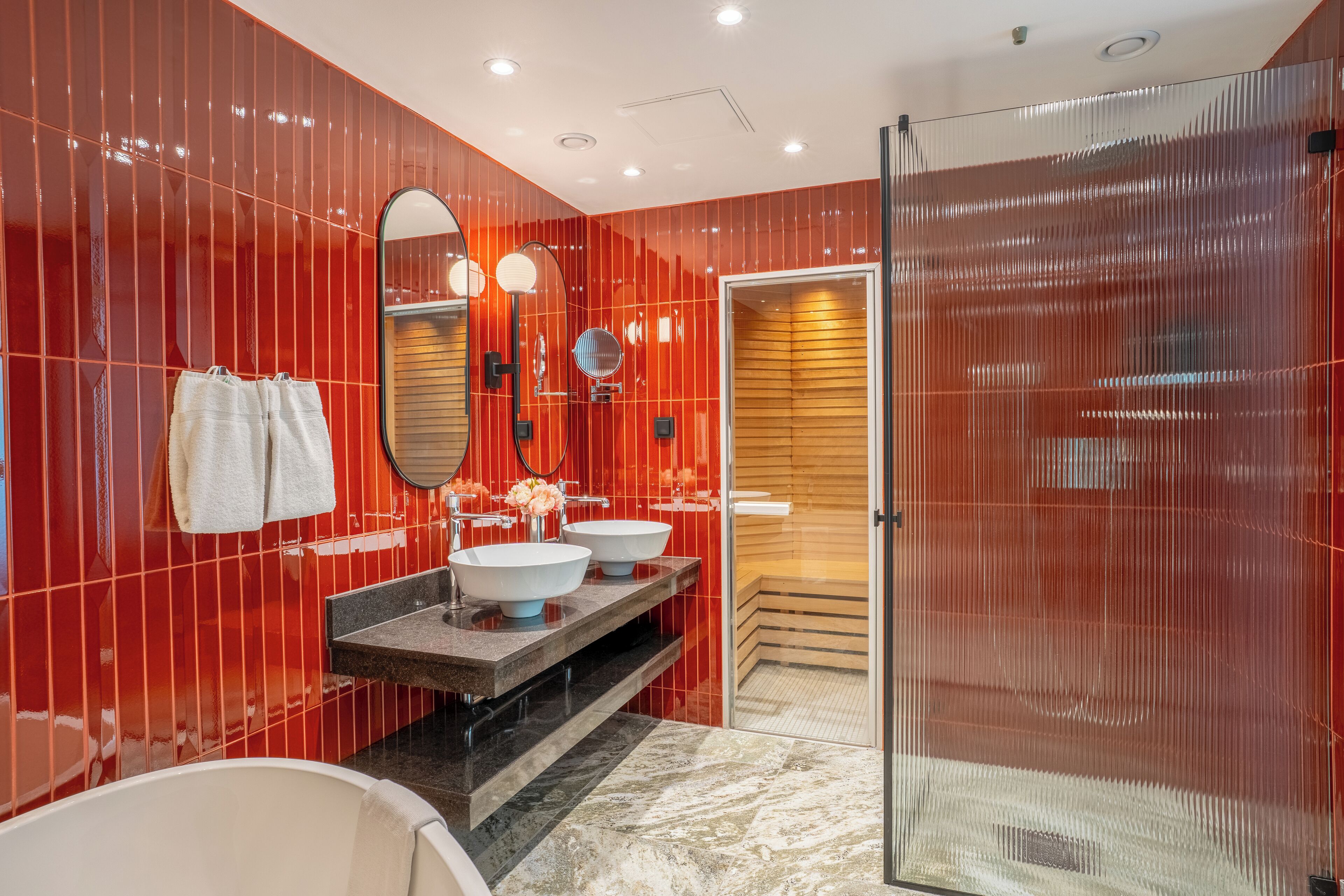 rainfall showerhead, eco-friendly toiletries, hair dryer, towels