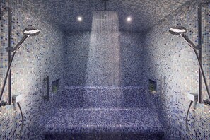 Separate bathtub and shower, rainfall showerhead, designer toiletries